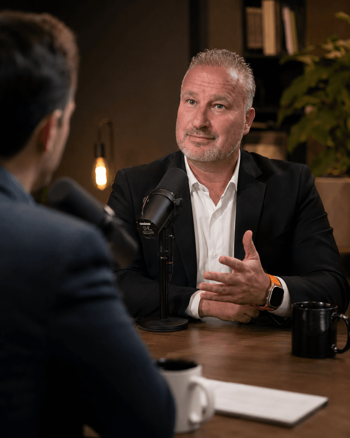 Alexander Holtermann recording a podcast